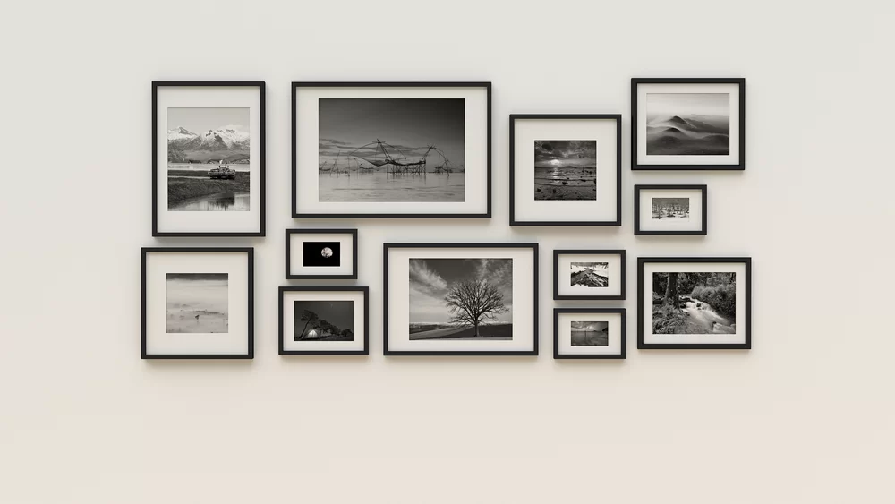 Gallery wall featuring beautiful black and white landscape pictures