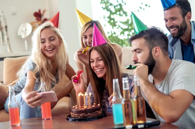 Young woman celebrating her birthday with friends