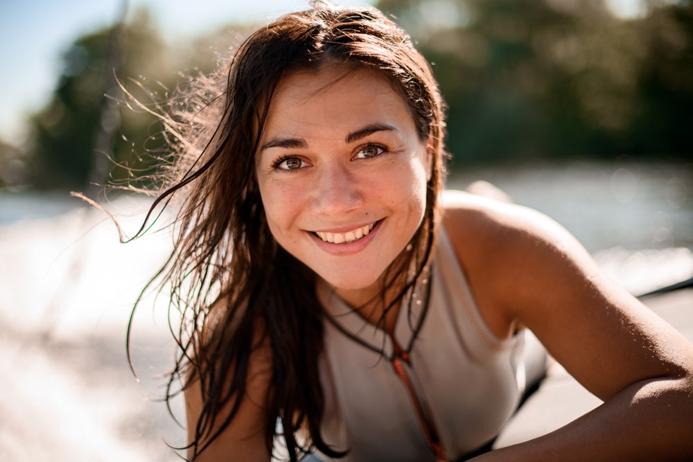 Smiling woman with brown eyes