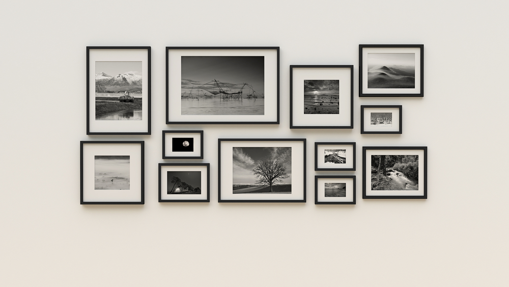 Gallery wall featuring beautiful black and white landscape pictures