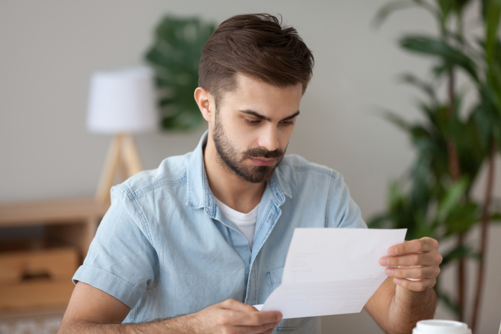 Son reading a goodbye letter from his estranged mother