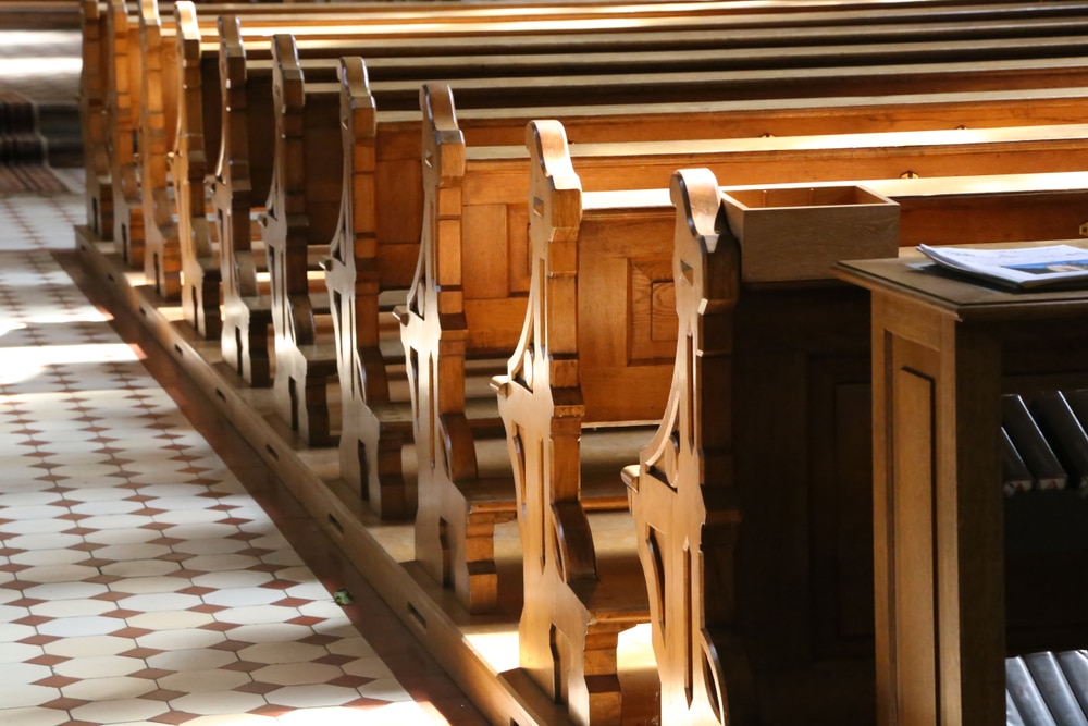 Empty church pews in a church preparing for its anniversary celebration